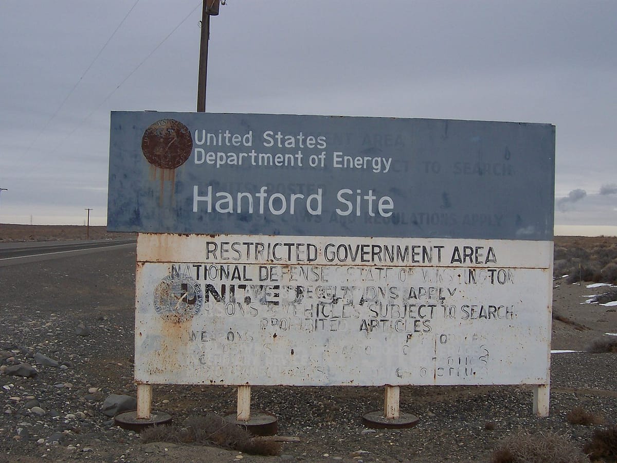 A weathered sign that reads: United States Department of Energy Hanford Site, Restricted Government Area